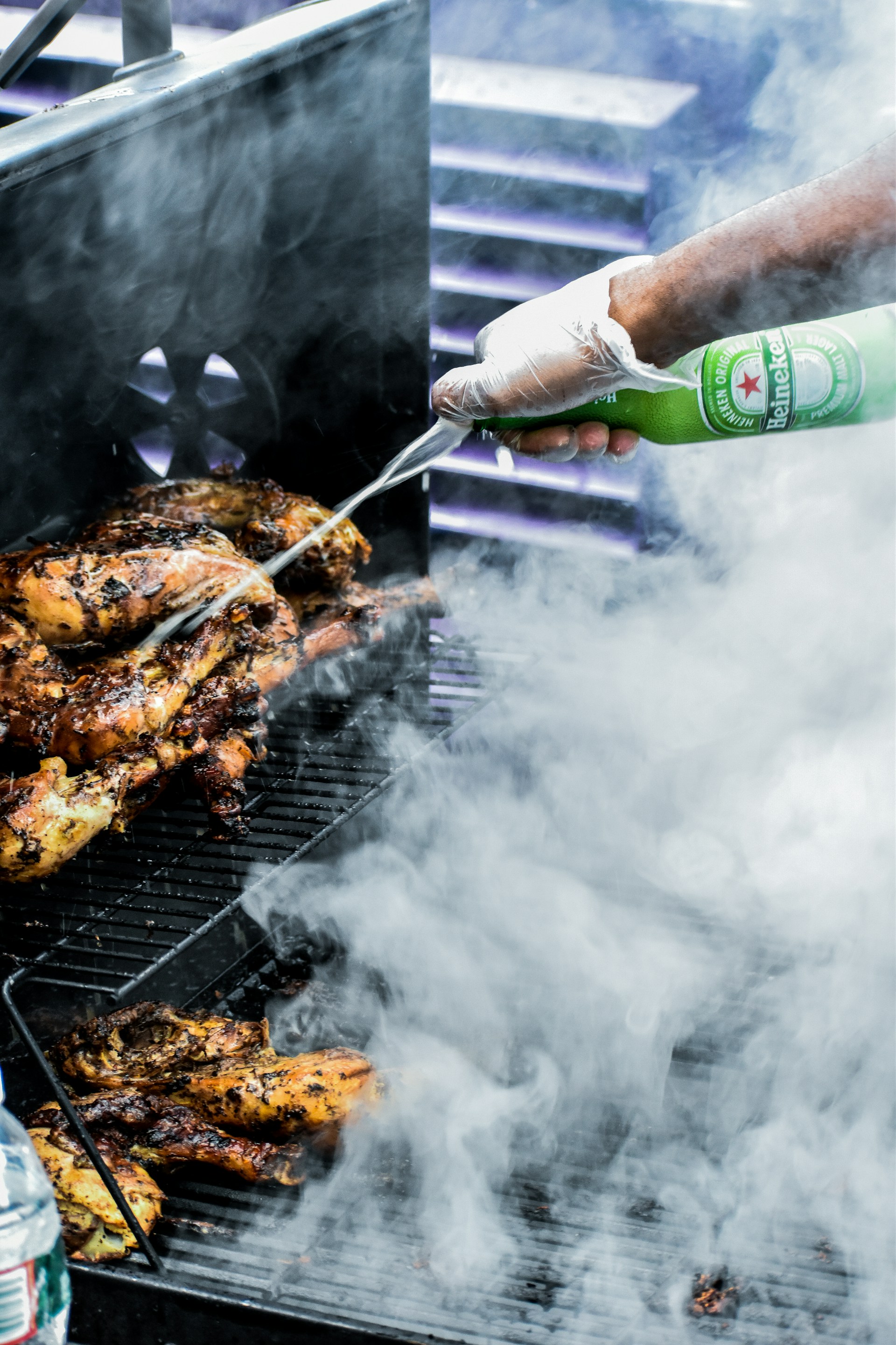 Host cooking jerk chicken
